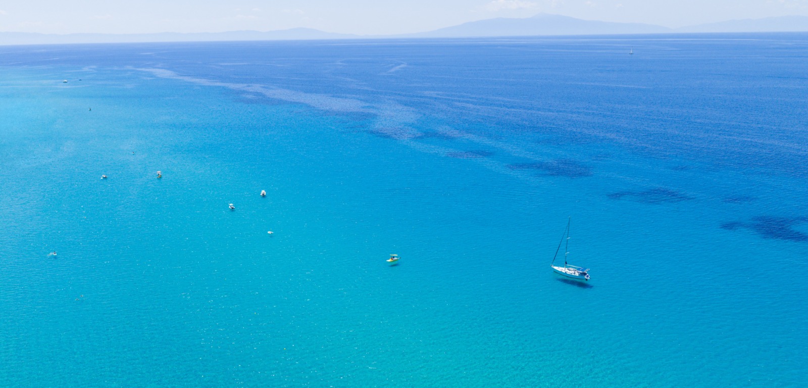 Ocean sailing yacht at anchor.